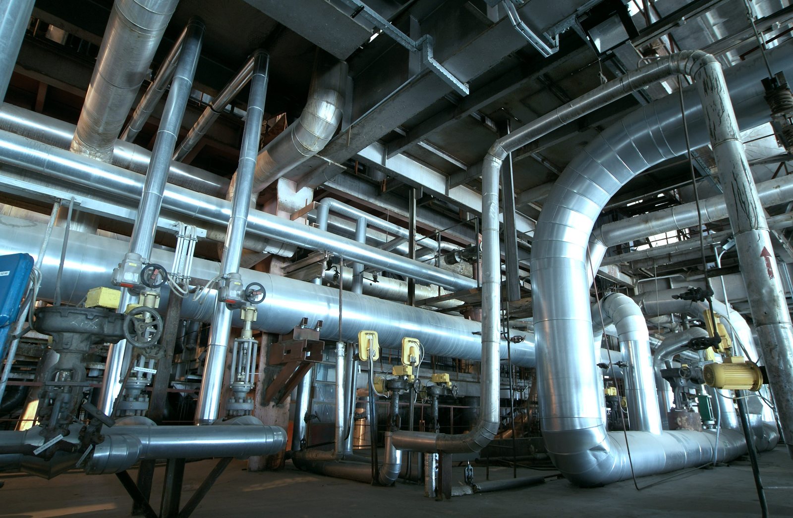 Insulated process piping running through a plant
