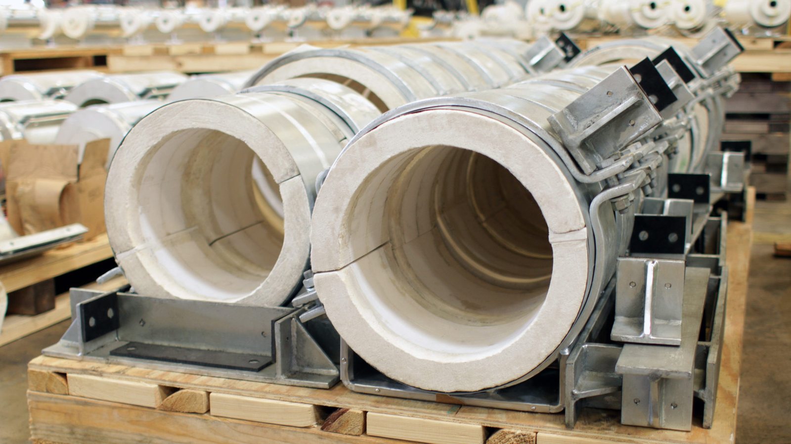 Insulated process piping at an industrial plant