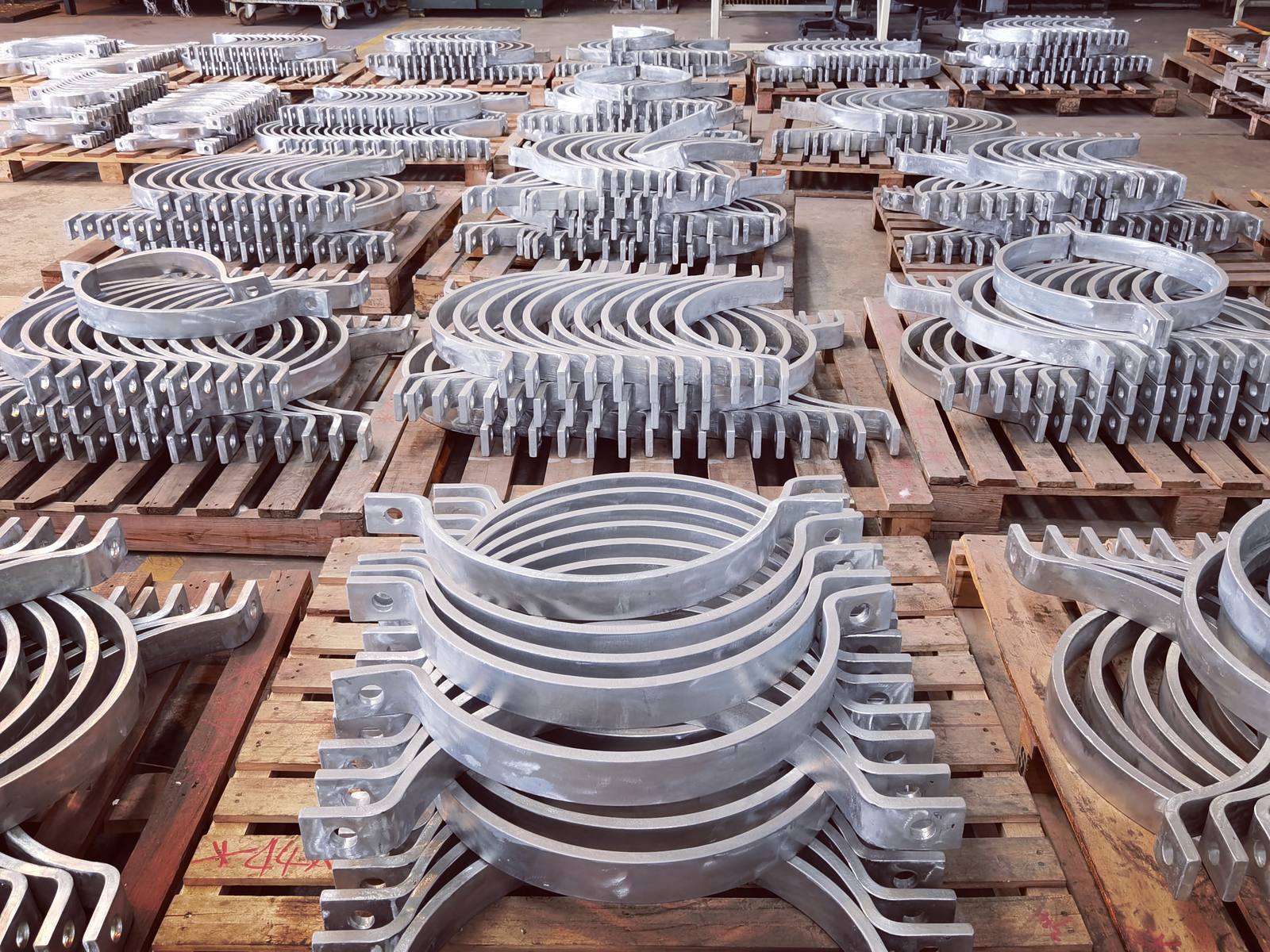 Finished pipe supports stacked in the workshop