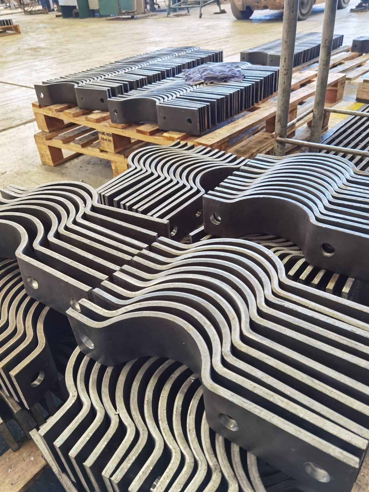 Finished pipe supports stacked in the CAE ASIA workshop